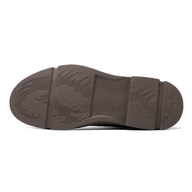 The sole of a brown shoe is depicted, highlighting a patterned design that combines functionality with visual interest.